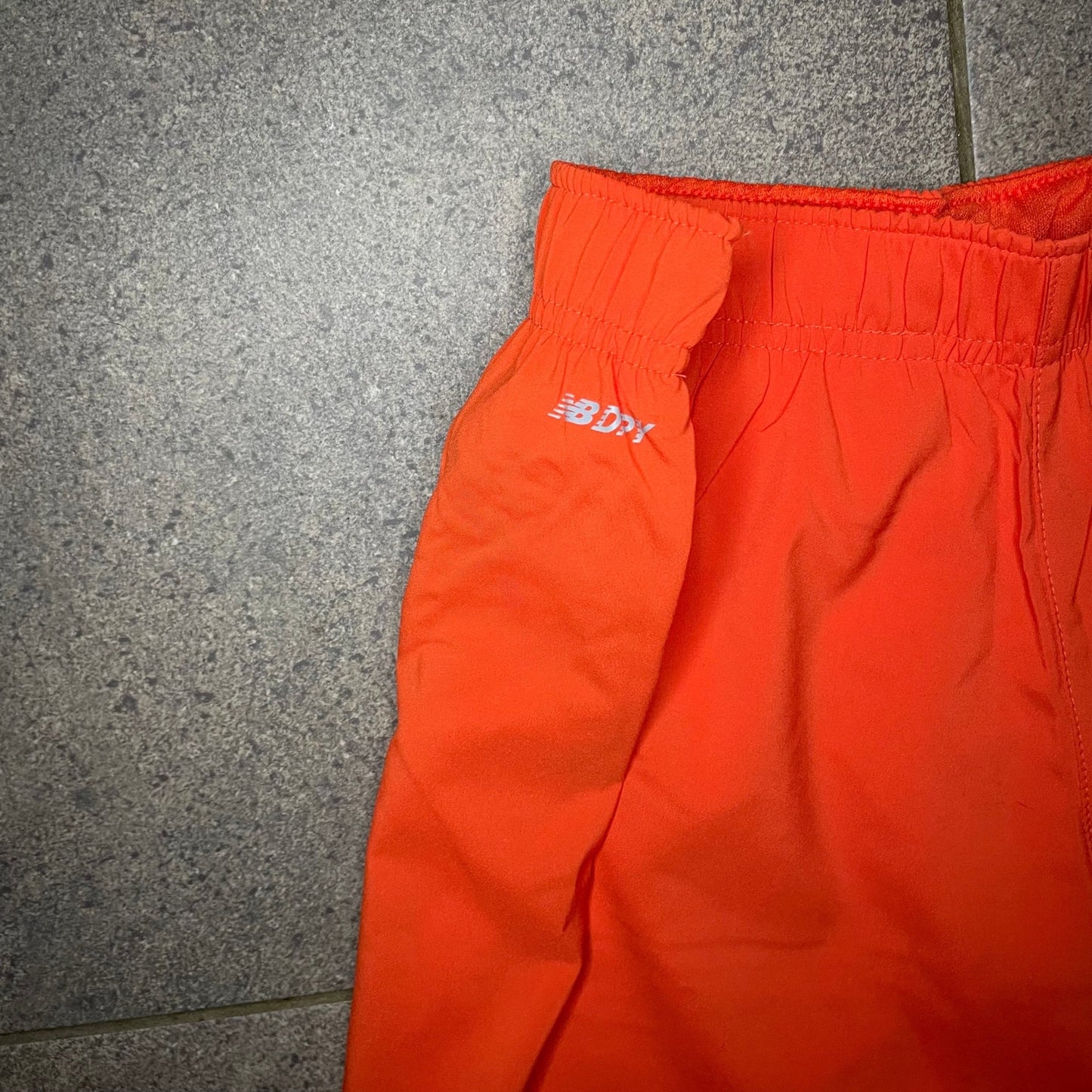 New Balance Orange Summer Shorts - WYGO.store